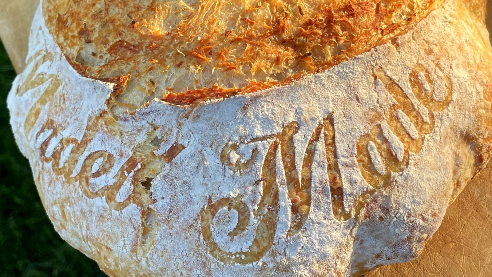 Sourdough loaf stenciled with MadelMade in script